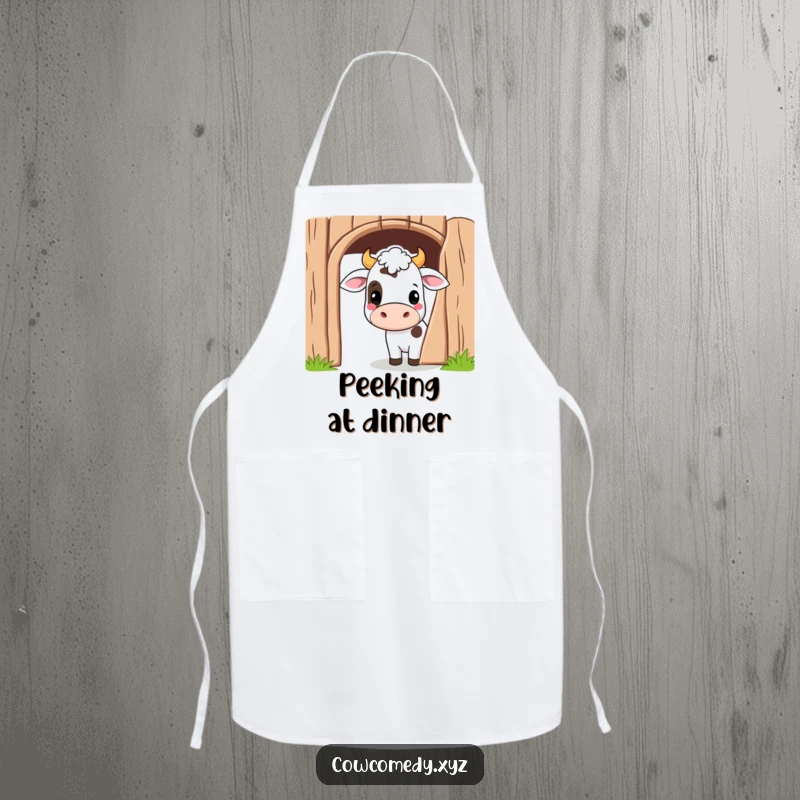 Funny Kawaii Cow Apron featuring a cute cartoon cow peeking playfully from behind a barn door, great for playful chefs.