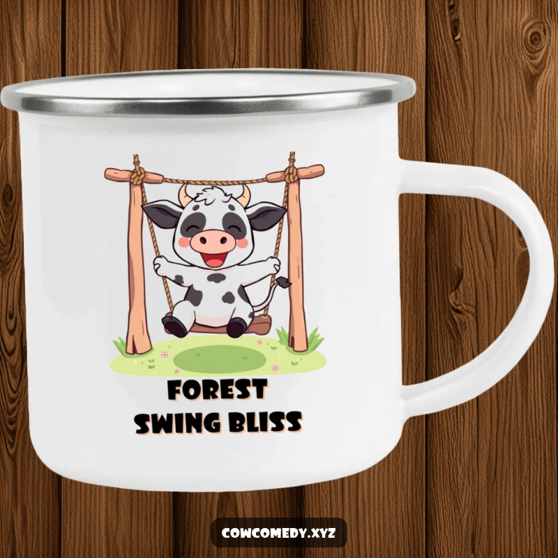 Funny Kawaii cow camping mug showing a cute character swinging energetically on a rope swing, perfect for humorous outdoor enthusiasts.