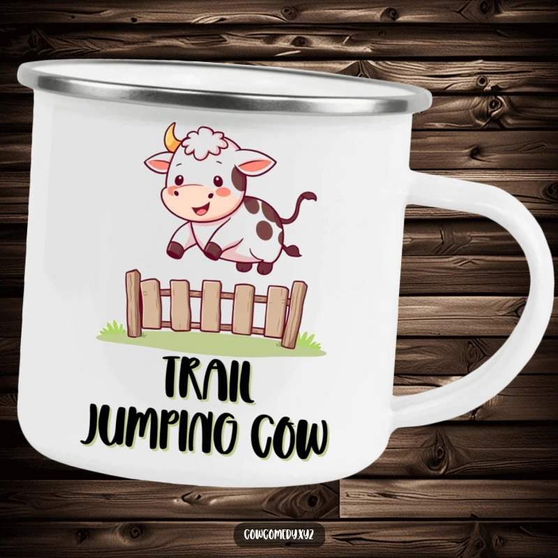 Funny enamel camping mug with a happy cow mid-jump, leaping over a small fence.
