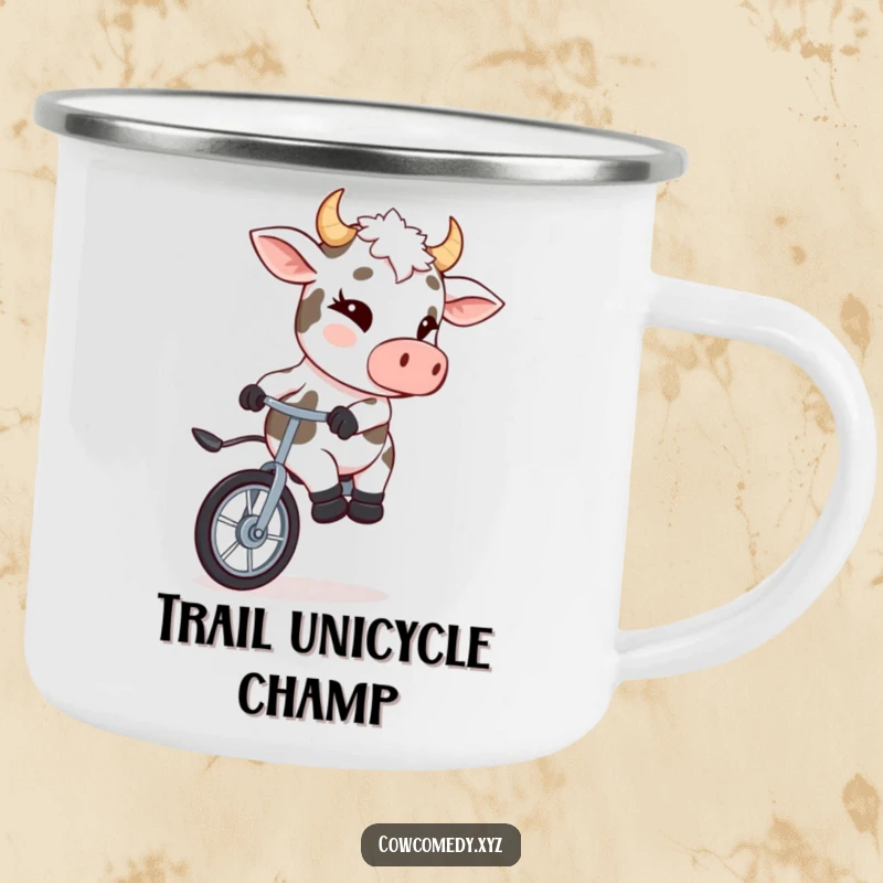 Funny camping mug showing a winking cow riding a unicycle, ideal for outdoor enthusiasts.