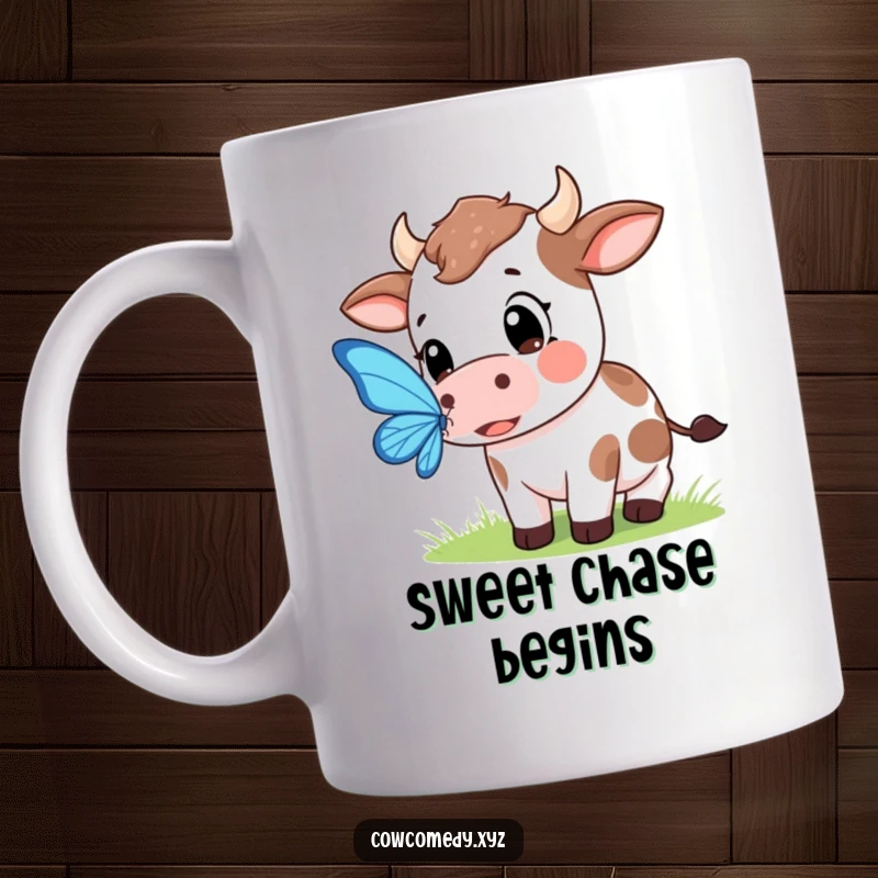 Funny mug showing a Kawaii cow with huge, wide eyes intently trying to catch a delicate butterfly.