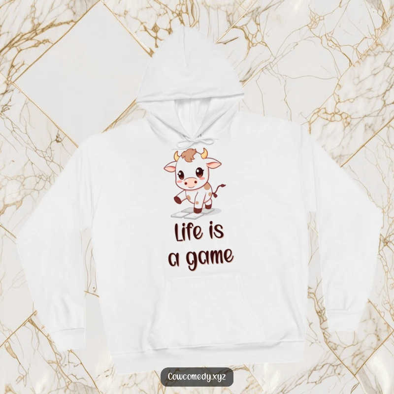 Funny Kawaii cow hoodie illustrating a cute character with big happy eyes playing hopscotch, combining warmth with playful, nostalgic humor.