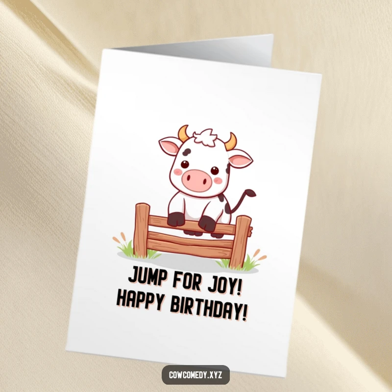 Funny Free Printable Birthday Card: A Kawaii cow mid-air, playfully jumping over a small fence with a silly grin.