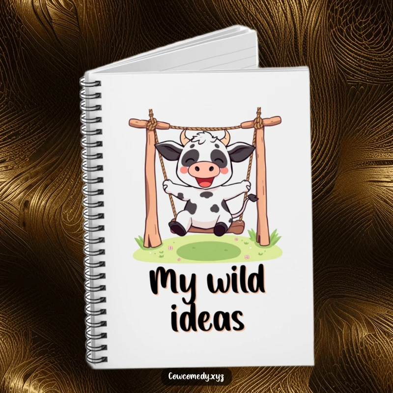 Funny Kawaii cow notebook featuring a cute character enthusiastically swinging on a rope swing, ideal for jotting down fun ideas.