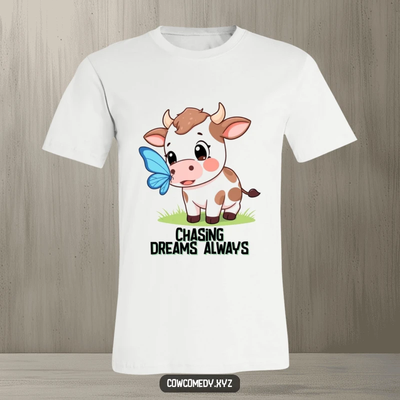 Funny t-shirt featuring a wide-eyed Kawaii cow earnestly trying to gently catch a fluttering butterfly.