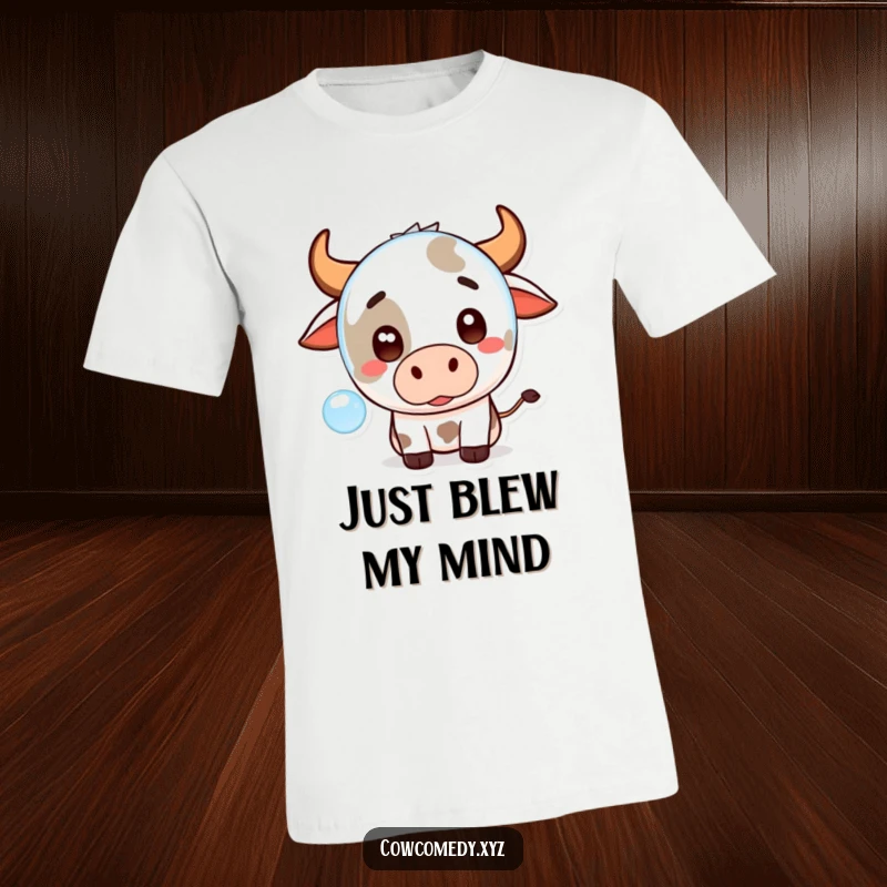 Funny Kawaii Cow T-Shirt featuring a cute, surprised cartoon cow reacting to a floating bubble, perfect for animal humor fans.