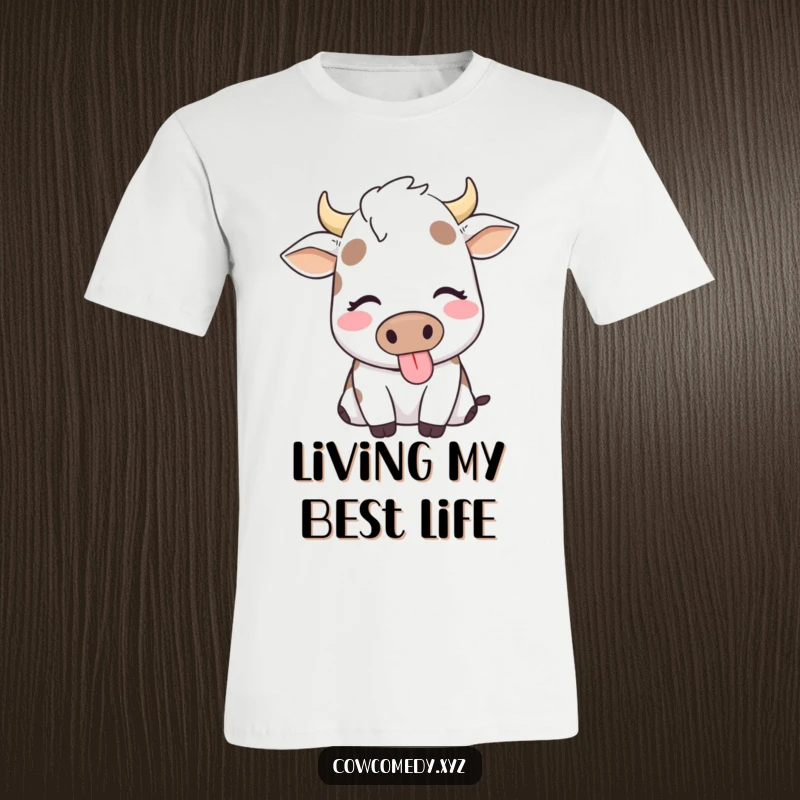 Funny t-shirt graphic of a cow with eyes closed, happily chewing, radiating contentment and peaceful joy.