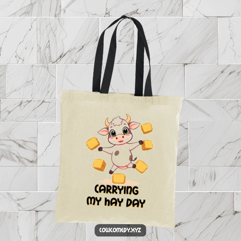 Funny tote bag with a playful calf balancing on three legs, juggling hay bales, perfect for carrying groceries with humor.
