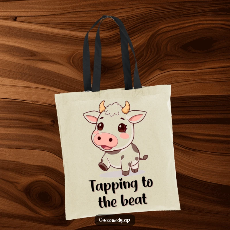 Funny tote bag featuring a kawaii cow character with hooves tapping an excited rhythm, perfect for carrying essentials with flair.